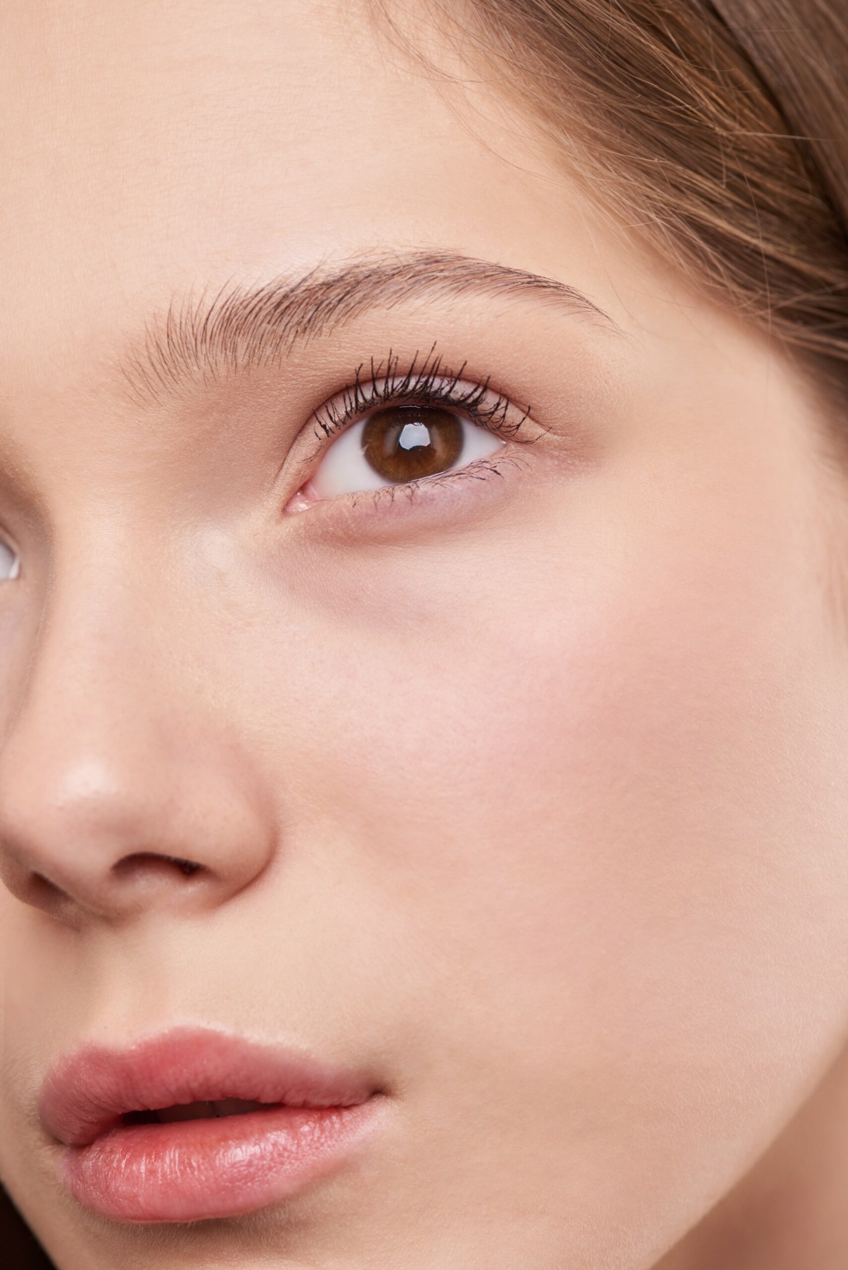 close up of white woman with brown eyes and smooth skin